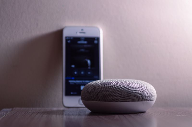A smart speaker on a table at home